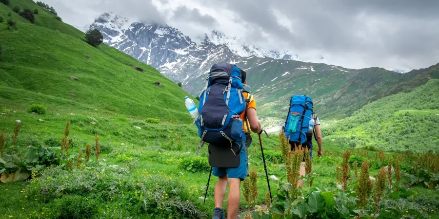 Tourists trekking during best season to visit Valley of Flowers